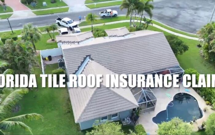 roof storm damage on Florida tile roof with cracked and displaced tiles after a storm
