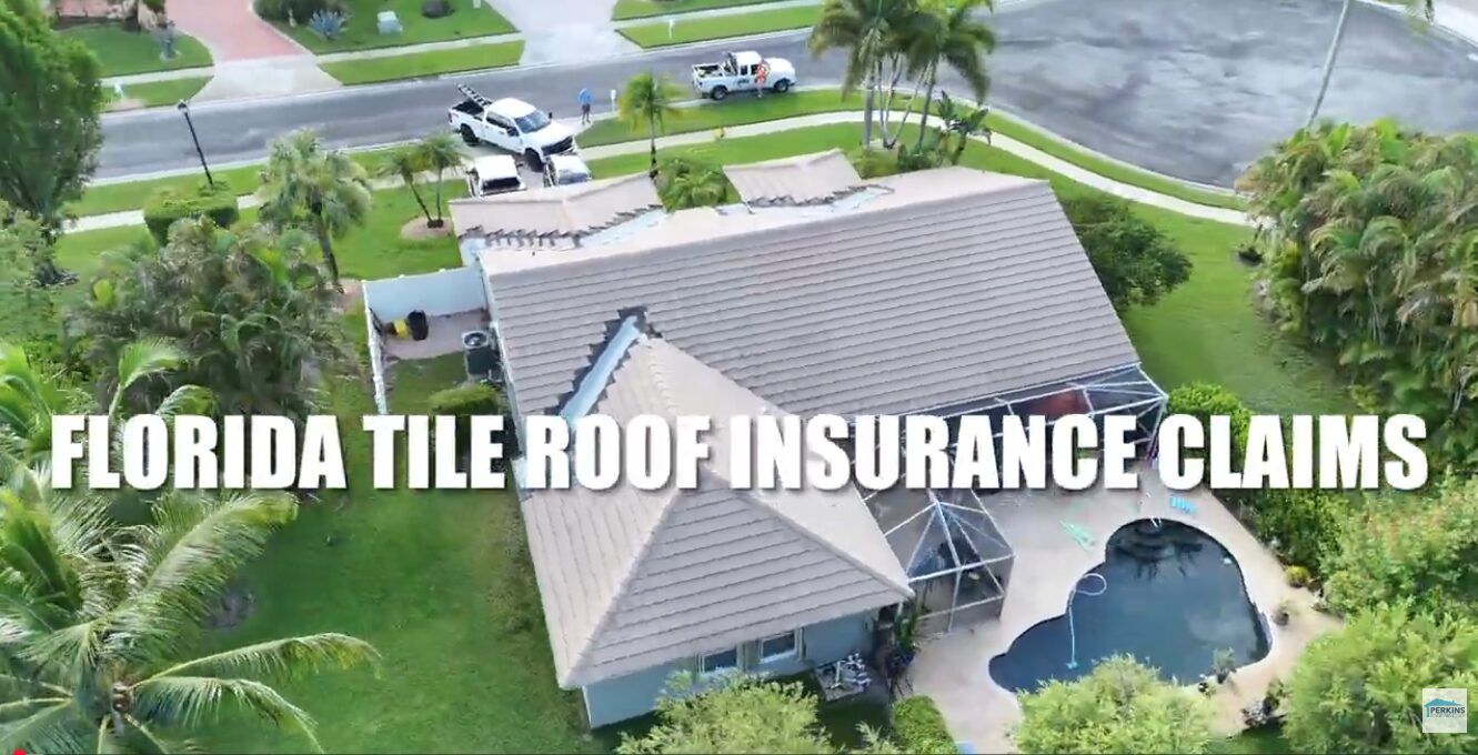 roof storm damage on Florida tile roof with cracked and displaced tiles after a storm